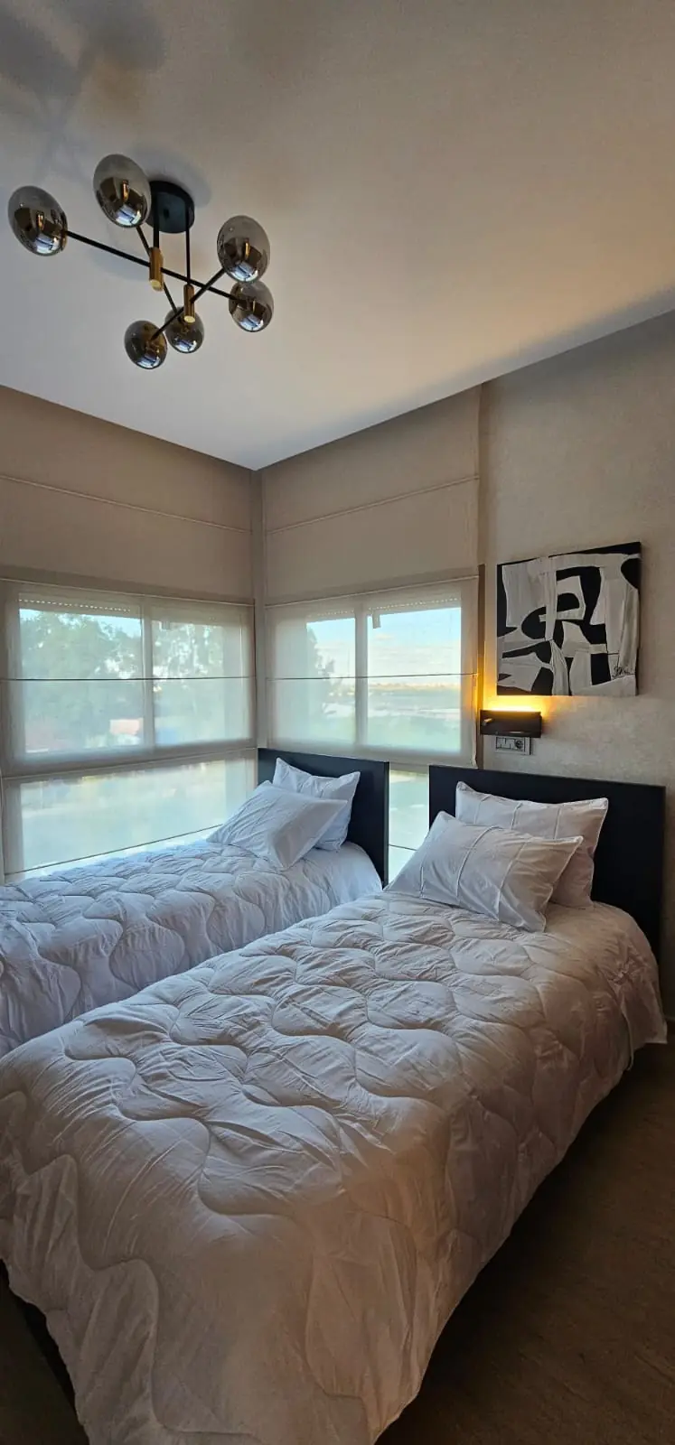 Chambre à deux lits livrée, appartement à Marrakech